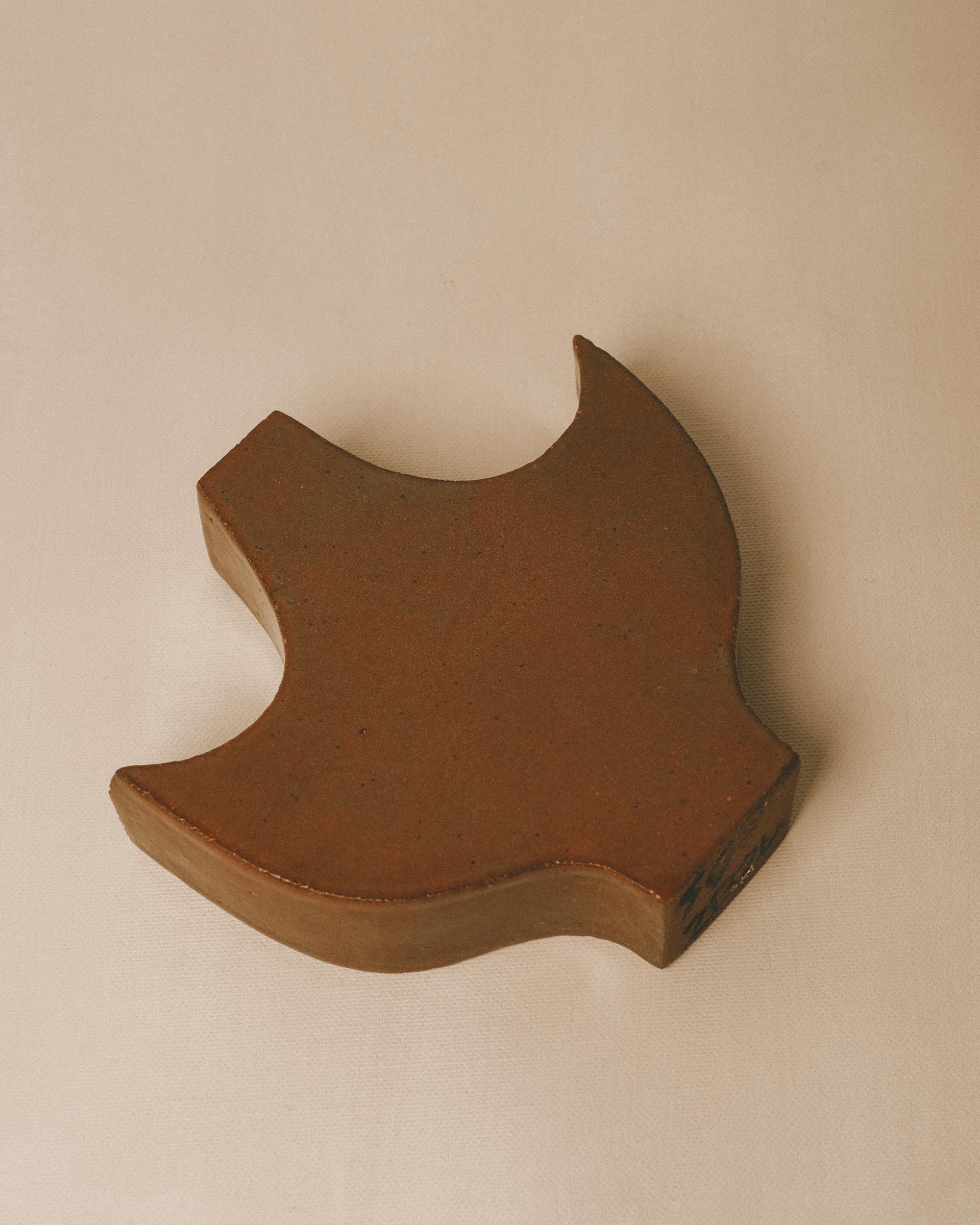 Side view of Small Angel 2 ceramic object by Shane Gabier