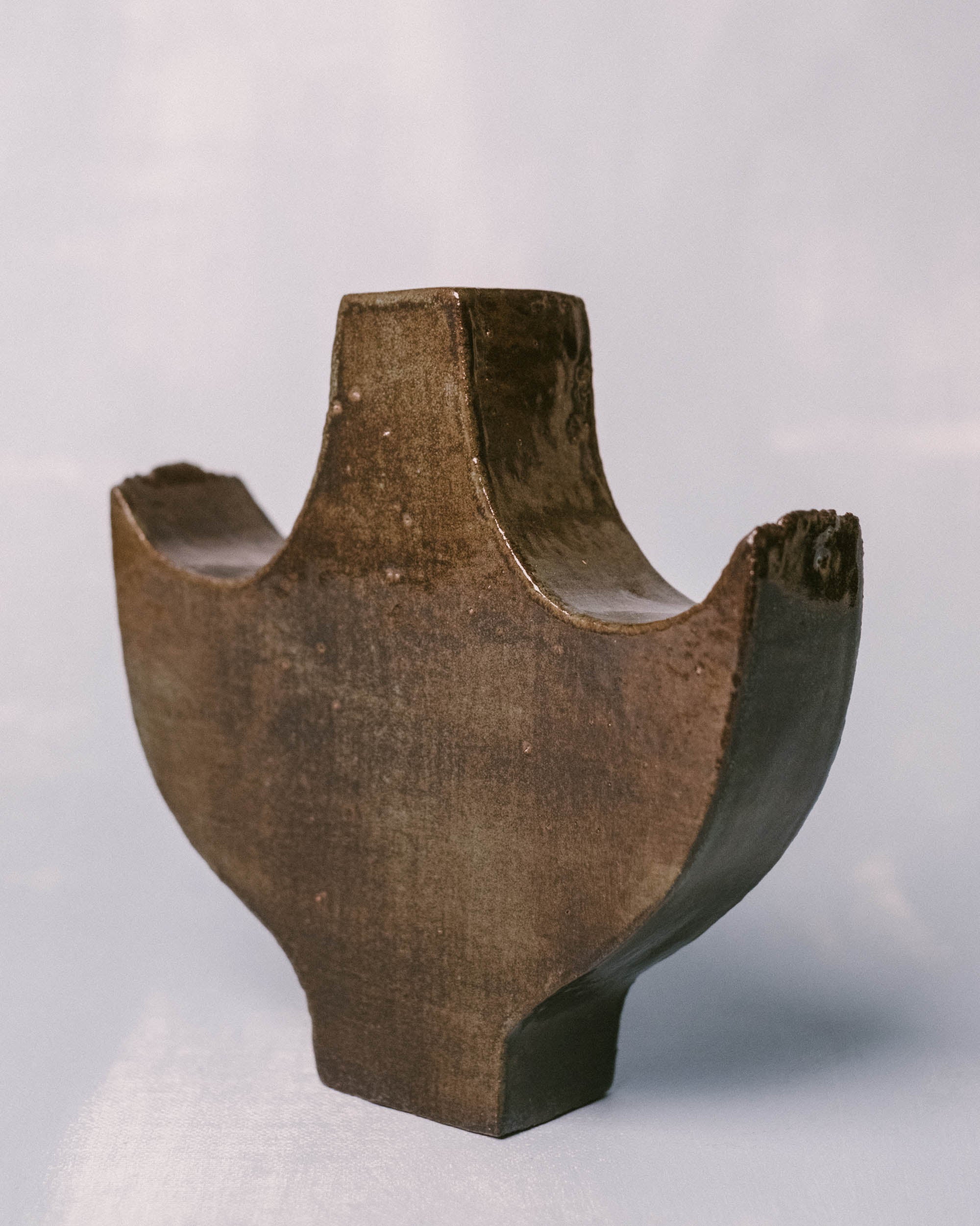 Side view of Small Angel 3 ceramic object by Shane Gabier