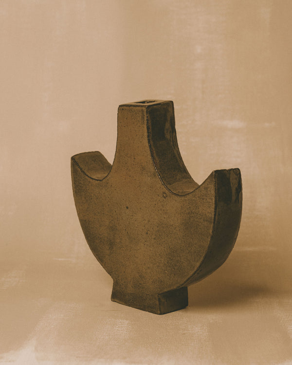 Side view of Small Angel 4 ceramic object by Shane Gabier