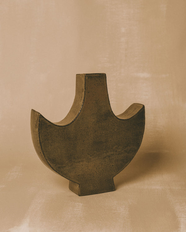 Side view of Small Angel 4 ceramic object by Shane Gabier