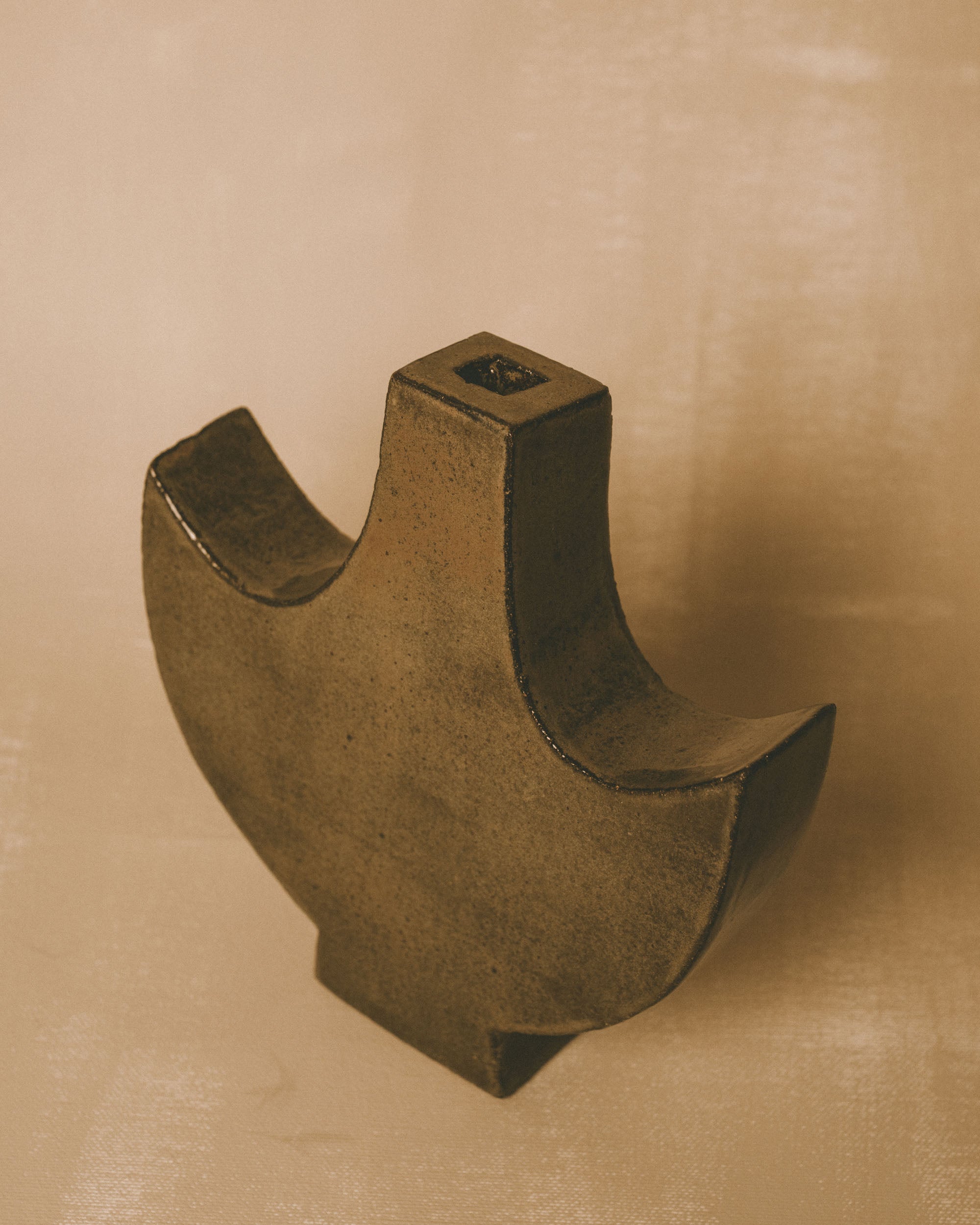 Side view of Small Angel 4 ceramic object by Shane Gabier