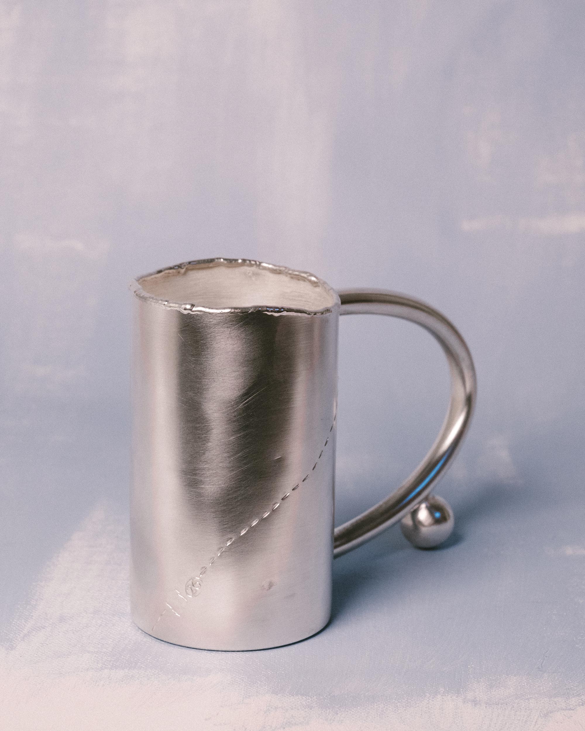 Tall silver-plated copper cup by Yeodong Yun with curved handle and sphere, Cup 10