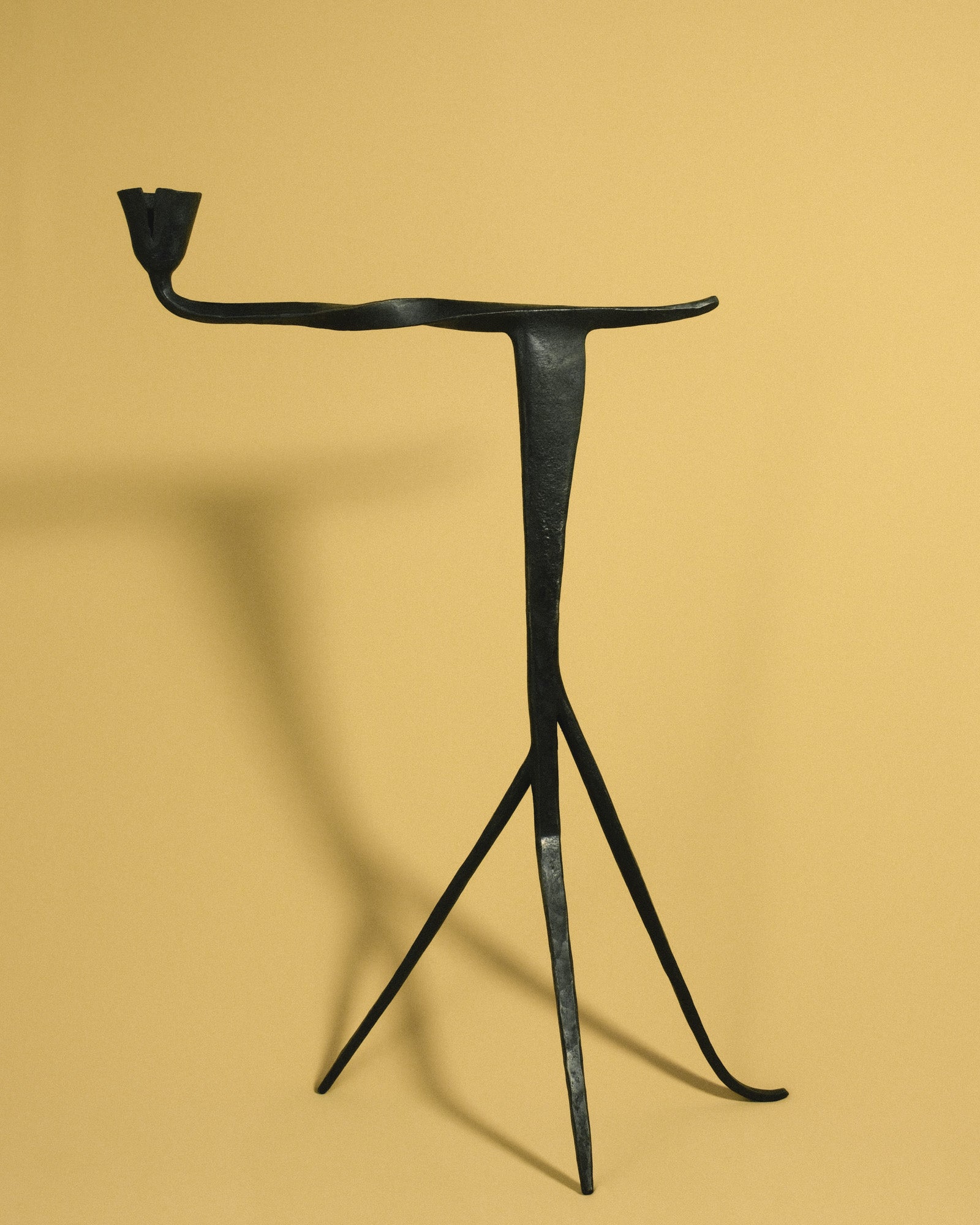 Agnieszka Owsiany Campanula Candle Holder hand-forged in Poland 2025, forged stem with subtle irregularities in metal balancing precision and material tension.