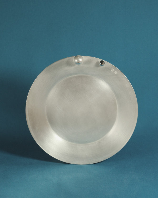 Yeodong Yun Plate 3 silver-plated copper vessel with circular form and two polished spheres altering weight and perception.