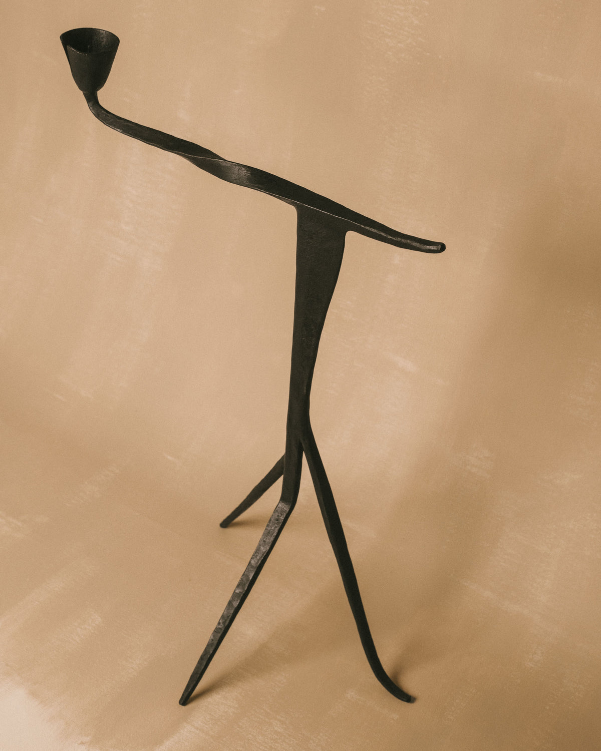 Agnieszka Owsiany forged candle holder, alternate angle of tripod legs