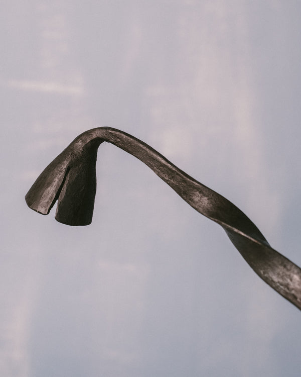 Agnieszka Owsiany Campanula Snuffer, hand-forged metal with sculptural curved profile