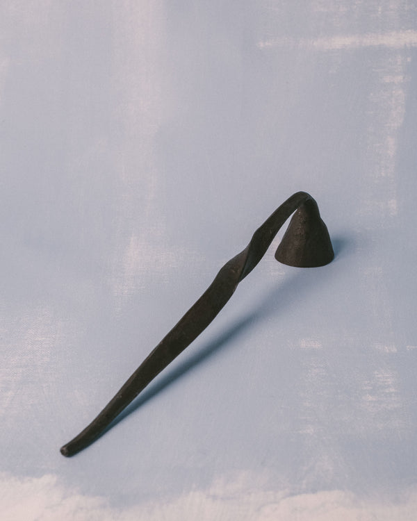 Agnieszka Owsiany Campanula Snuffer, hand-forged metal candle tool by blacksmith Andreas Billert, full length view