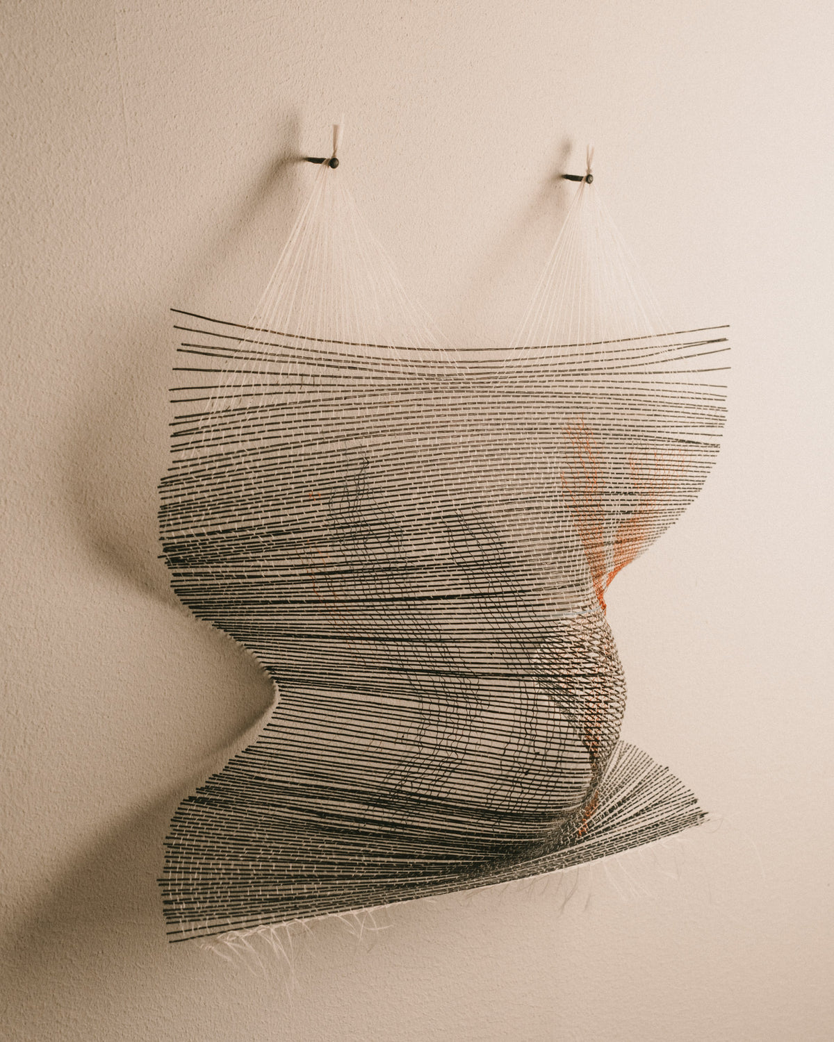 Linear rhythm of woven thread on Highway, angled view