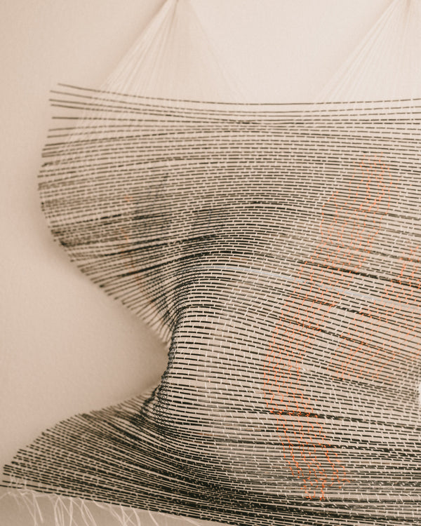 Close-up of red painted thread within Highway's woven composition