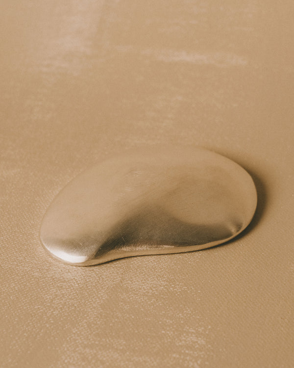 Reverse of Christian+Jade Mirror in polished stainless steel, sculptural silver-plated form