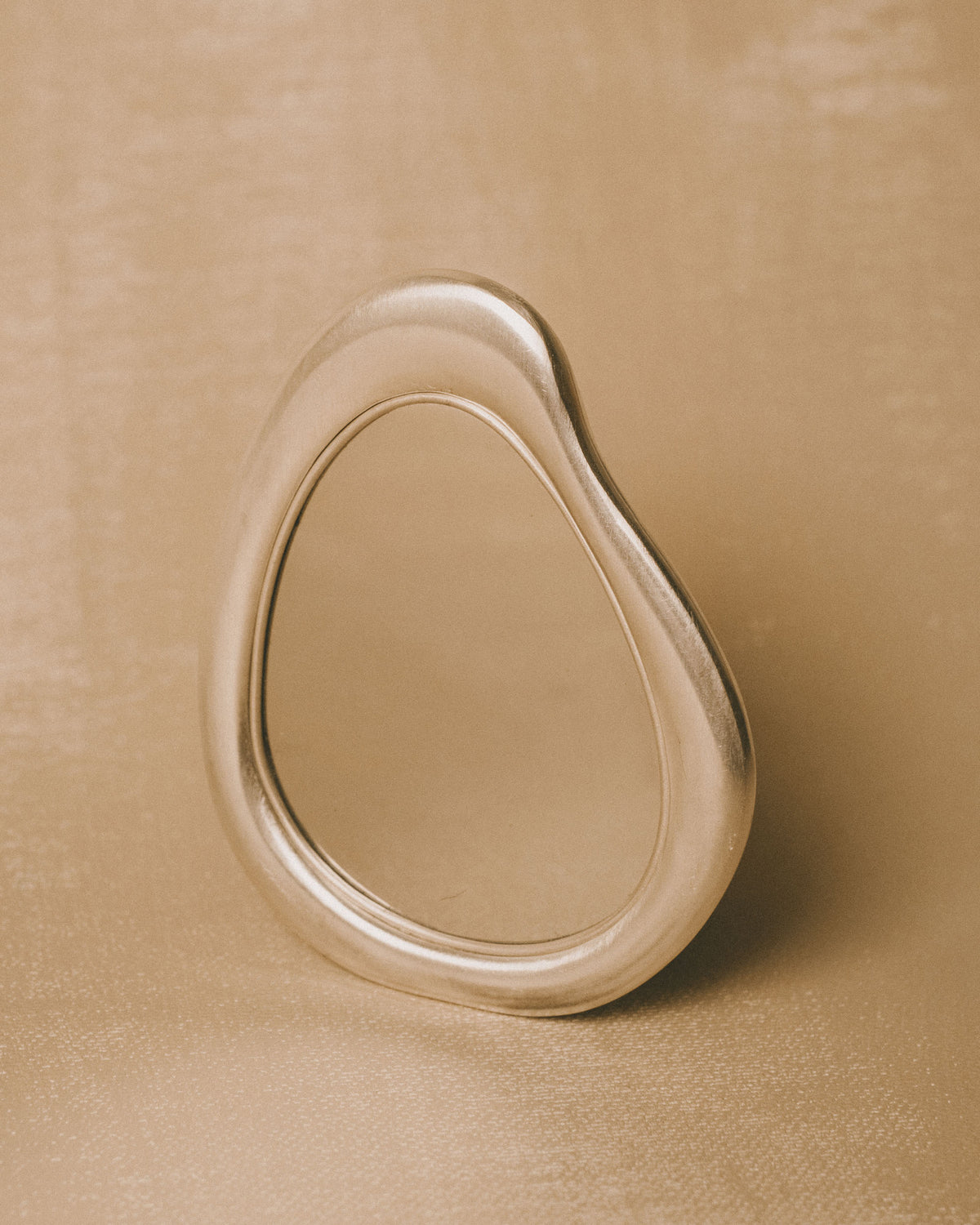 Christian+Jade Mirror, sculptural silver-plated metal object in polished stainless steel, standing upright