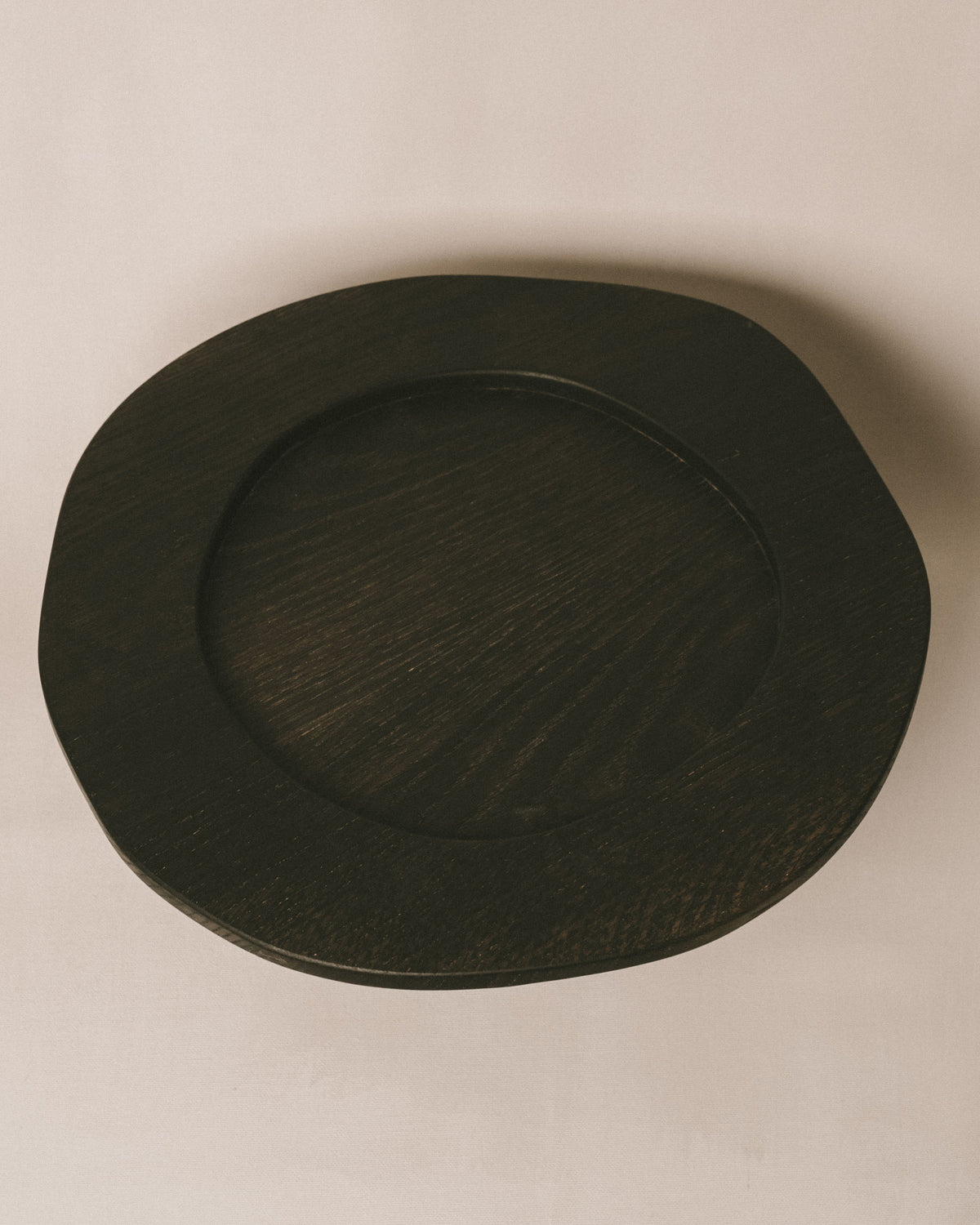 Top surface detail of Christian+Jade Pedestal, oxidised oak with natural grain variation