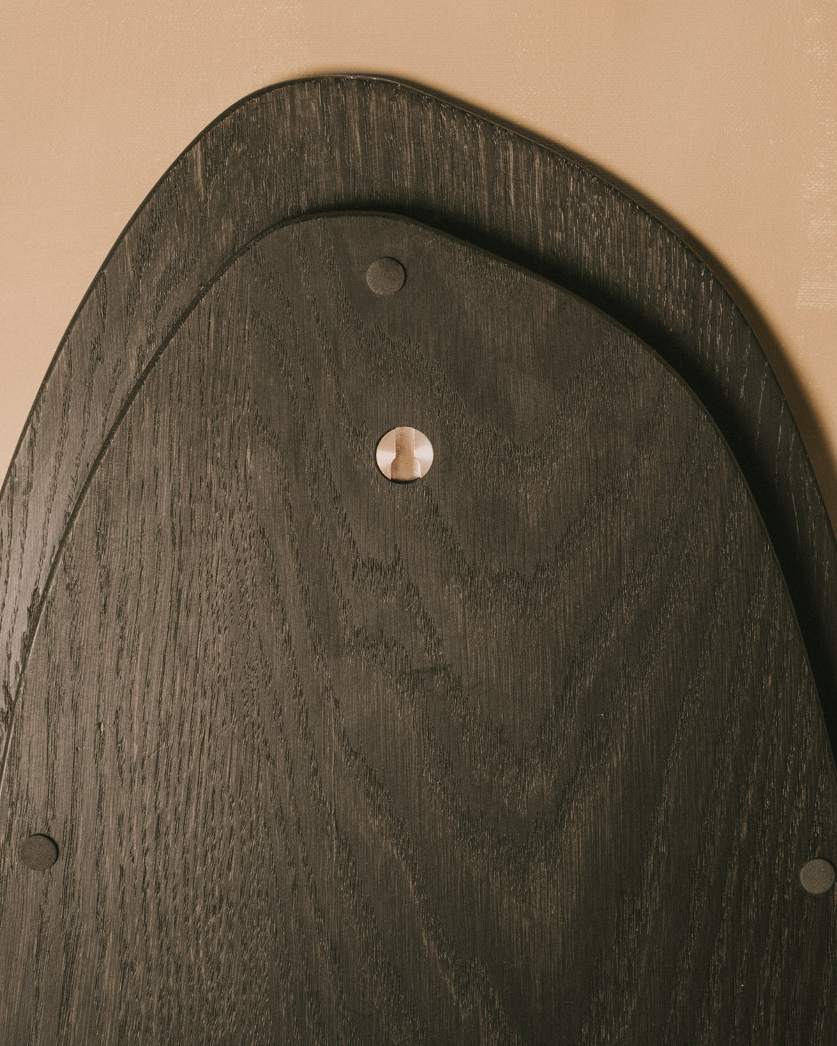 Grain detail of Christian+Jade Tray in oxidised oak, showing sharp geometry and natural wood variation