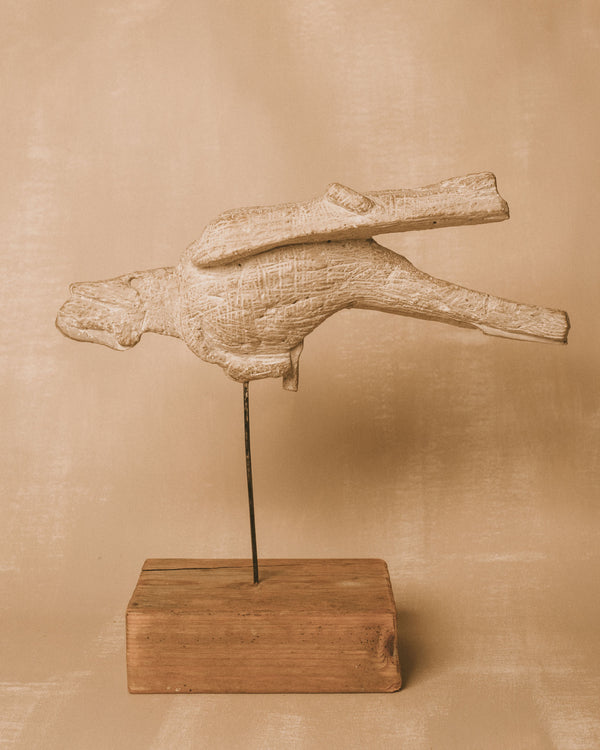 Carved faience figure by Evert Lindfors, wooden mount, angled view