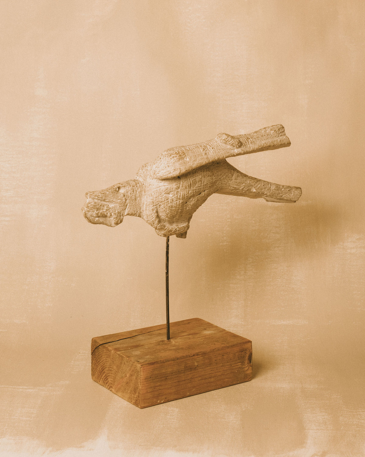 Flying Figure Sculpture by Evert Lindfors, carved faience on wooden base, front view