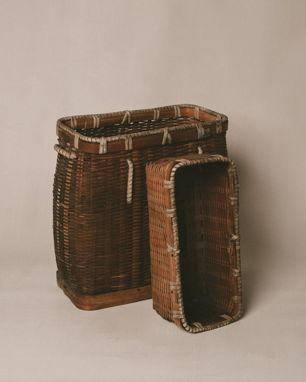 Wooden base detail of handwoven bamboo basket, joinery close-up
