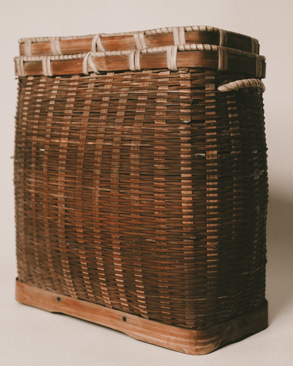 Handwoven bamboo basket, reinforced base, opposite angle view