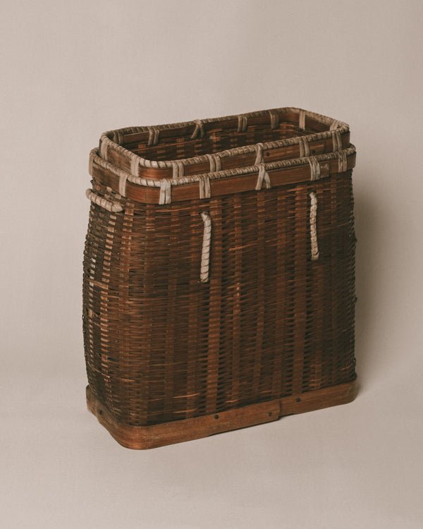 Top-down view of bamboo basket rim, rope reinforcement detail