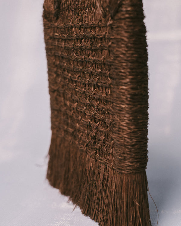 Cut fringe detail of handwoven Taiwanese brush in natural palm fiber