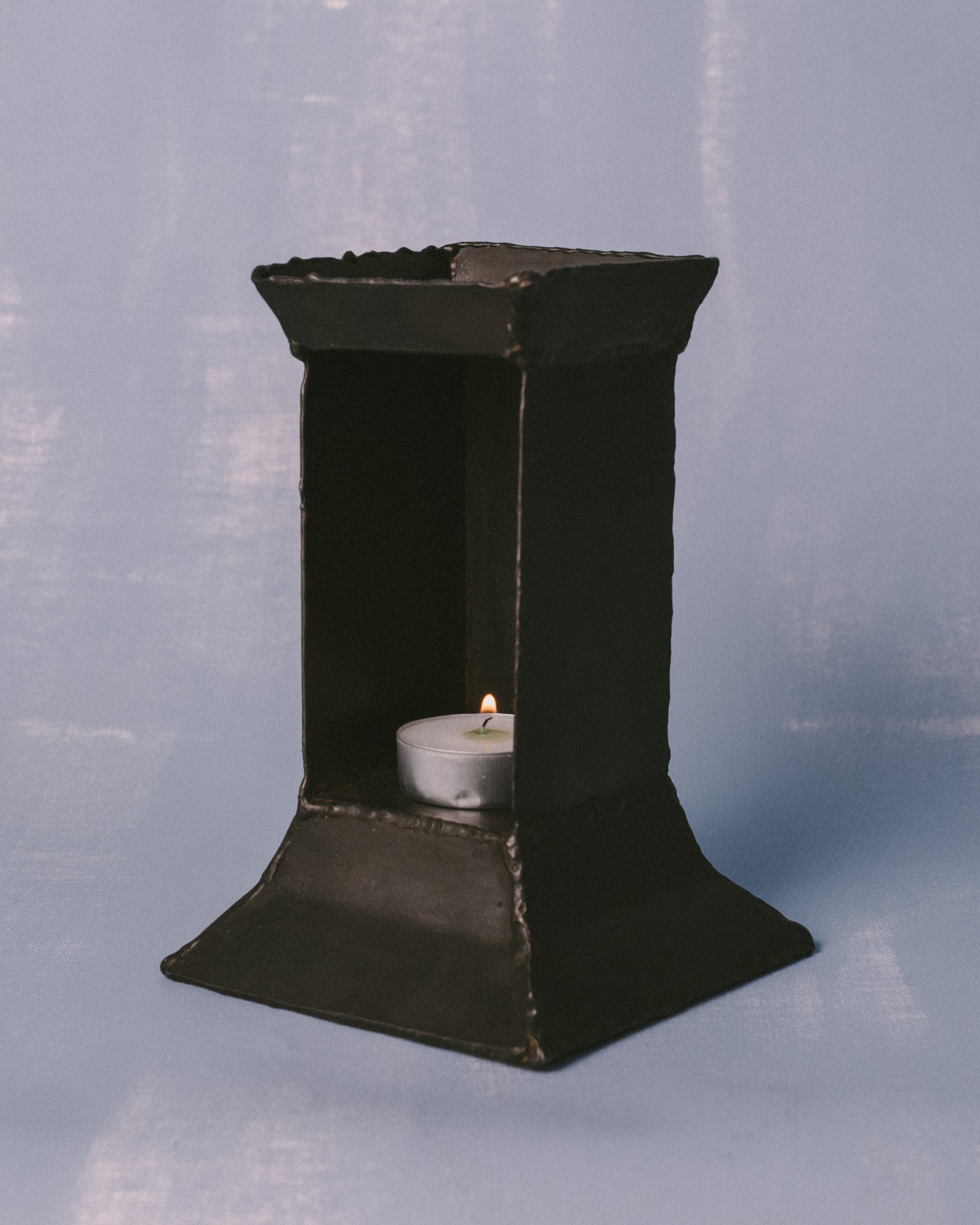 Eternal Elders Ember by Hannah Kuhlmann, patinated steel oil burner, three-quarter view