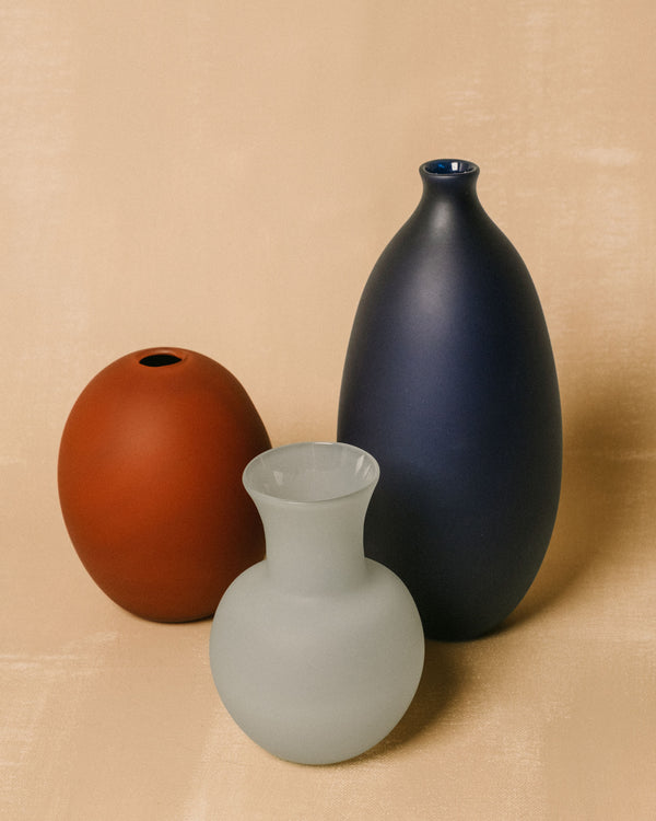 Vase No. 1080 in Sky shown with other Verre d'Onge glass vessels, group view