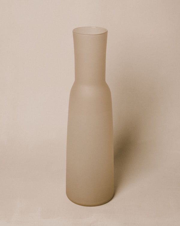Tall tapered form of Vase No. 969 in Moon, handblown glass, angled view