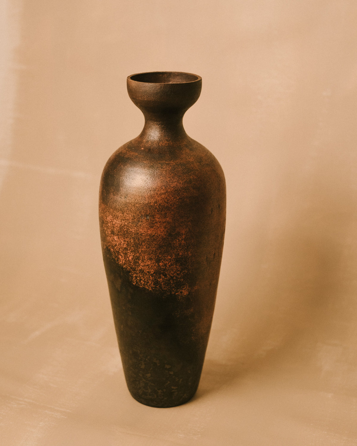 Tall form of Lipari 1, terra sigillata surface, angled view