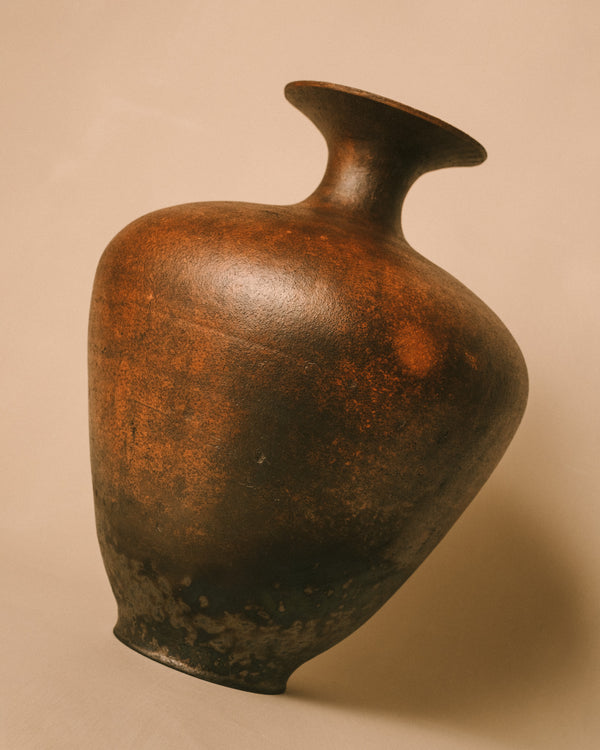 Curved neck of Ven 2 vessel, terra sigillata surface, angled view