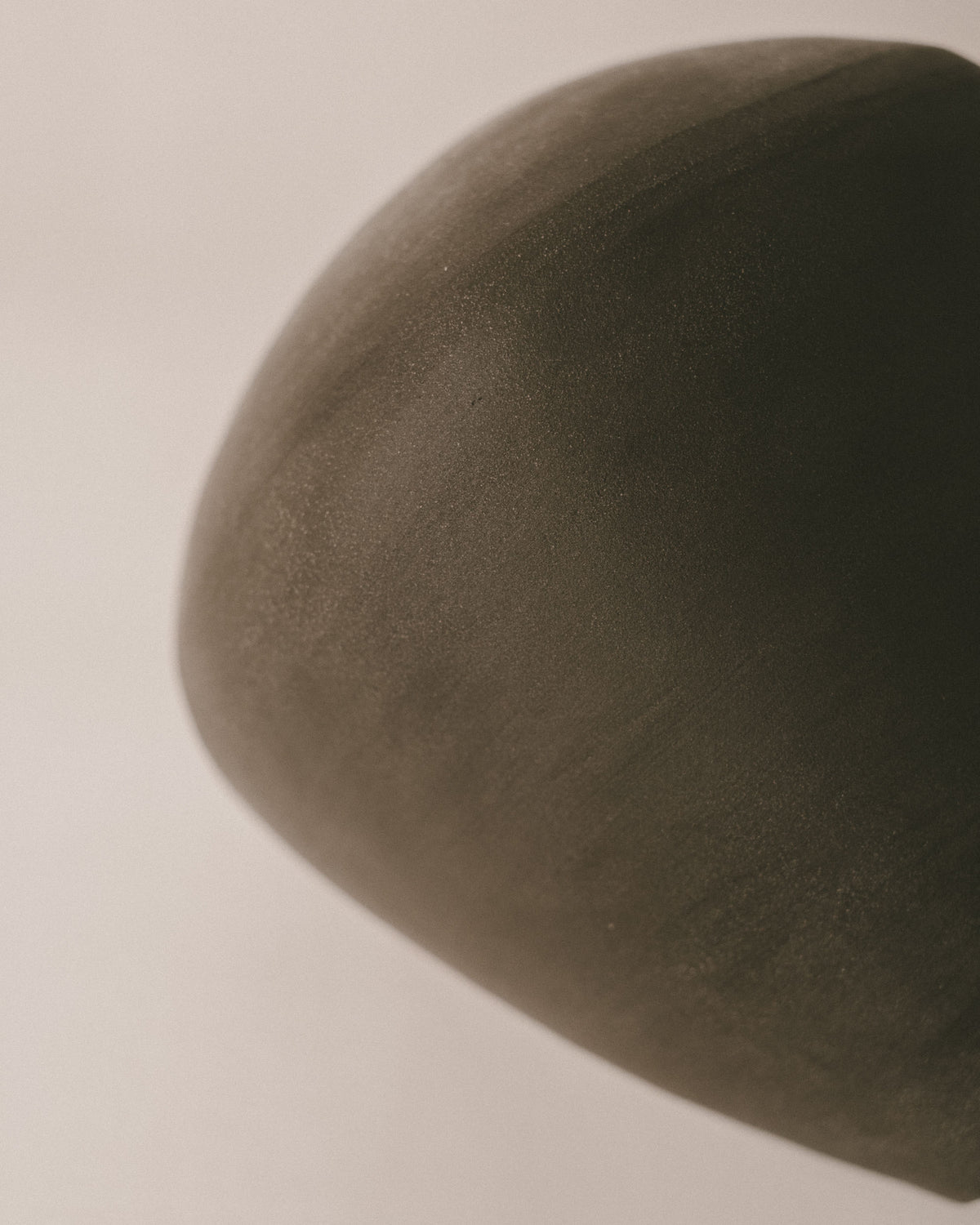 Base detail of Volume Vessel I, natural clay tone, hand-built texture