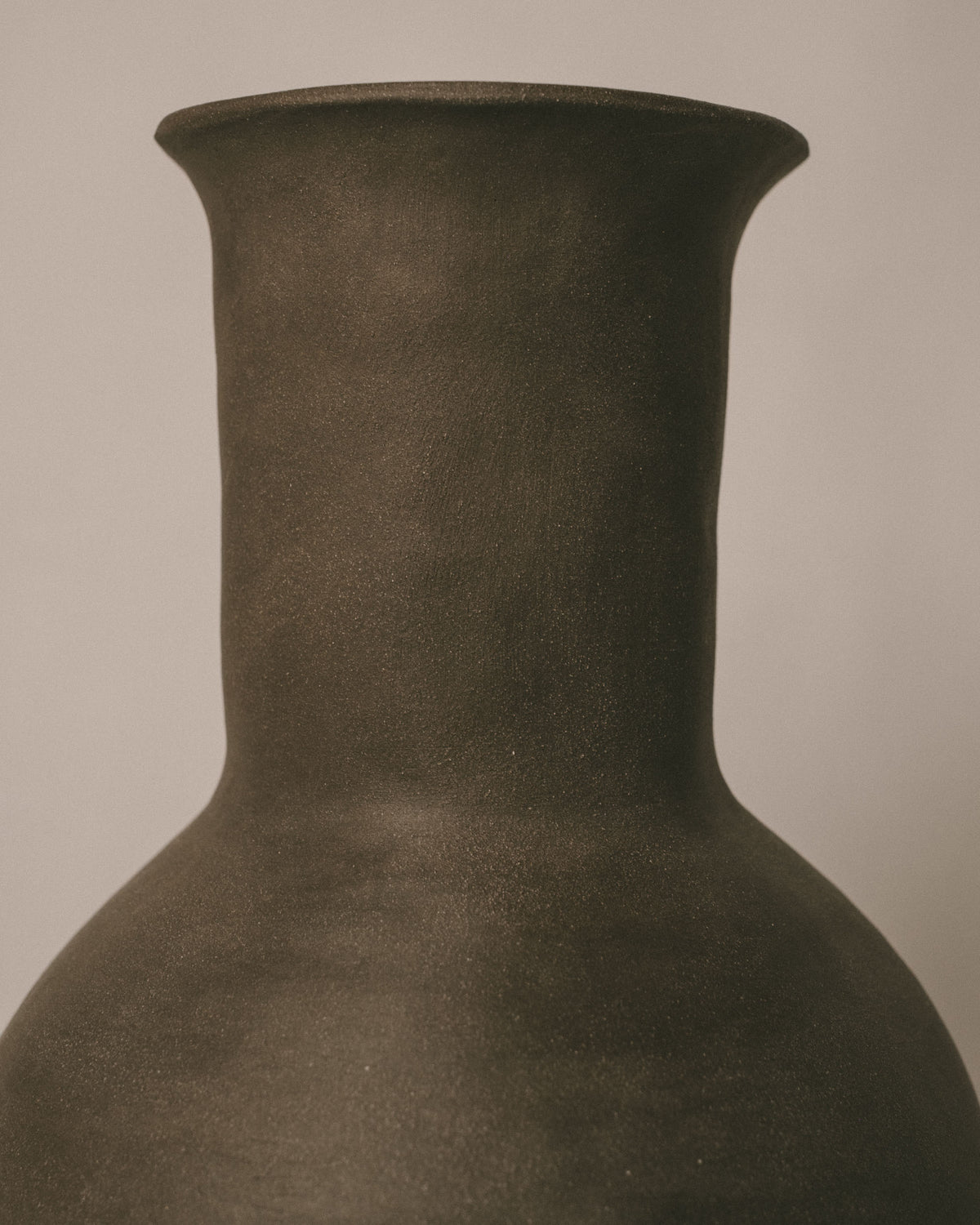 Rounded form of Volume Vessel II, hand-built clay, angled view