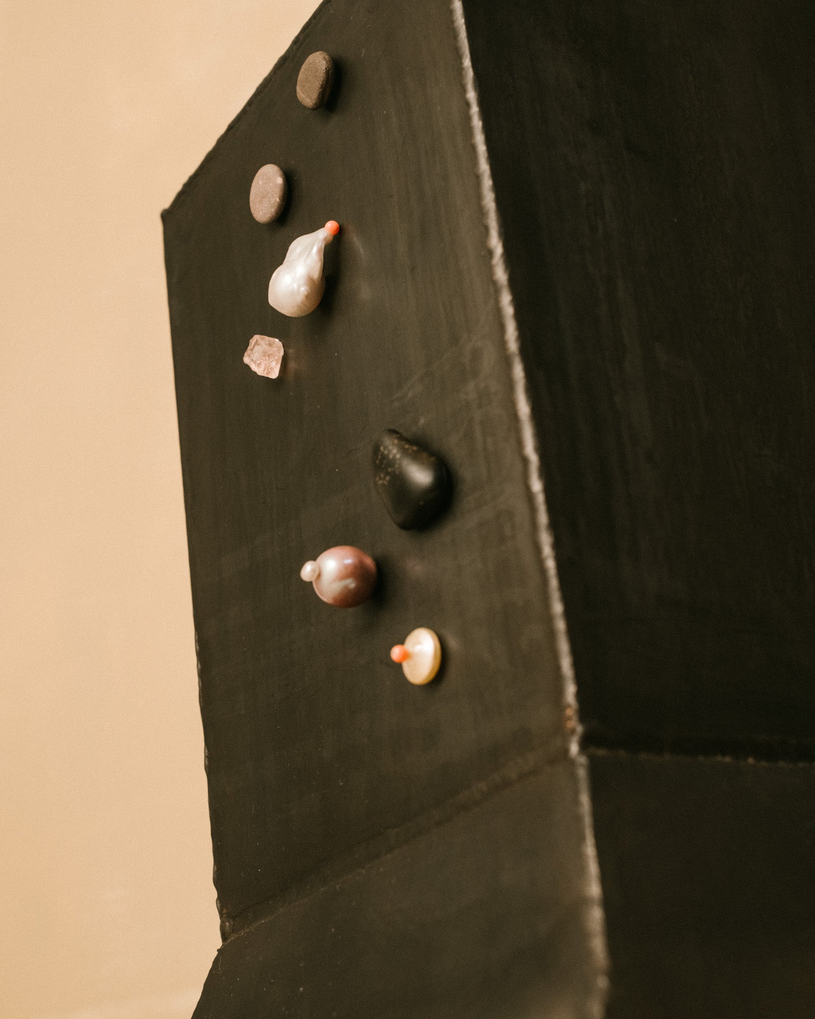 Cabinet Jewellery by Lisa Scherebnenko on Hannah Kuhlmann's Eternal Elders Vitrine, angled view showing magnetic pieces