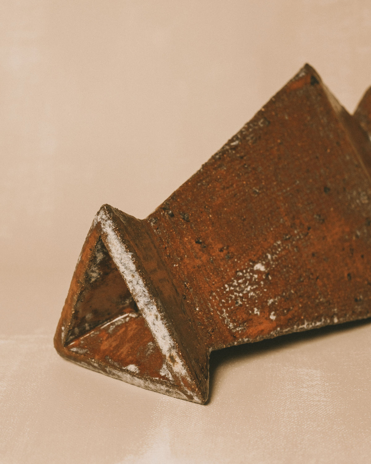 Close-up of faceted triangular form, Shane Gabier's Triangular Vase 2