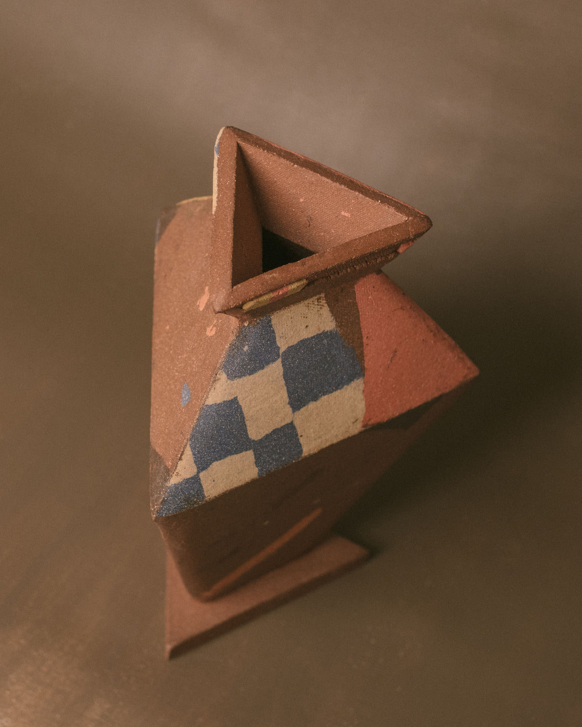 Geometric checkered surface of Triangular Vase, angled view