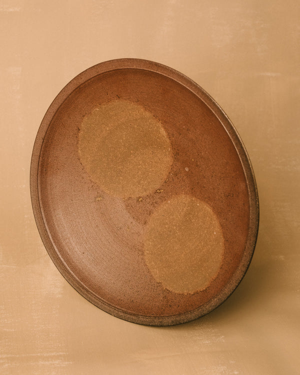 Shallow form of Sharlen Nozawa's Bizenyaki plate, large size, three-quarter view