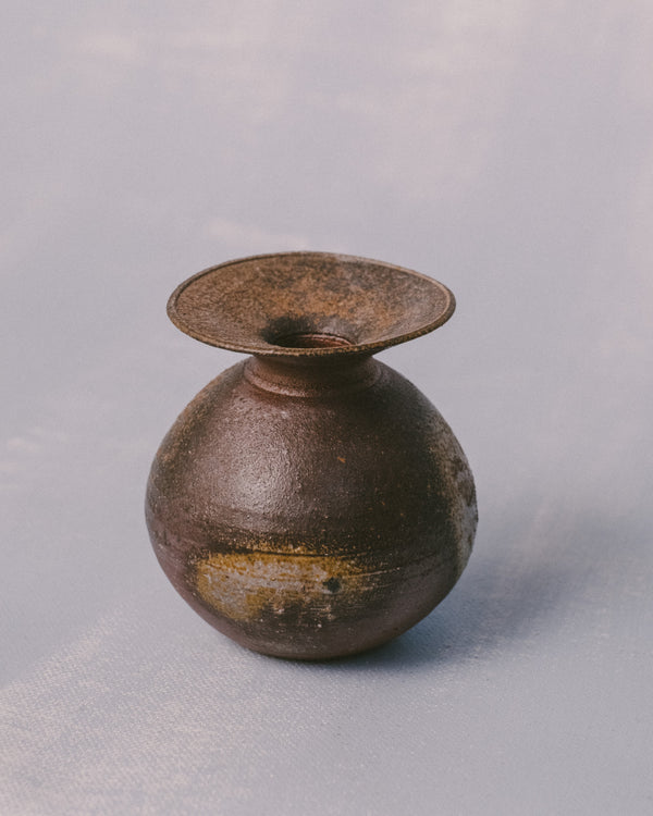 Rounded form of Sharlen Nozawa's Bizenyaki vase, wood-fired stoneware, side profile