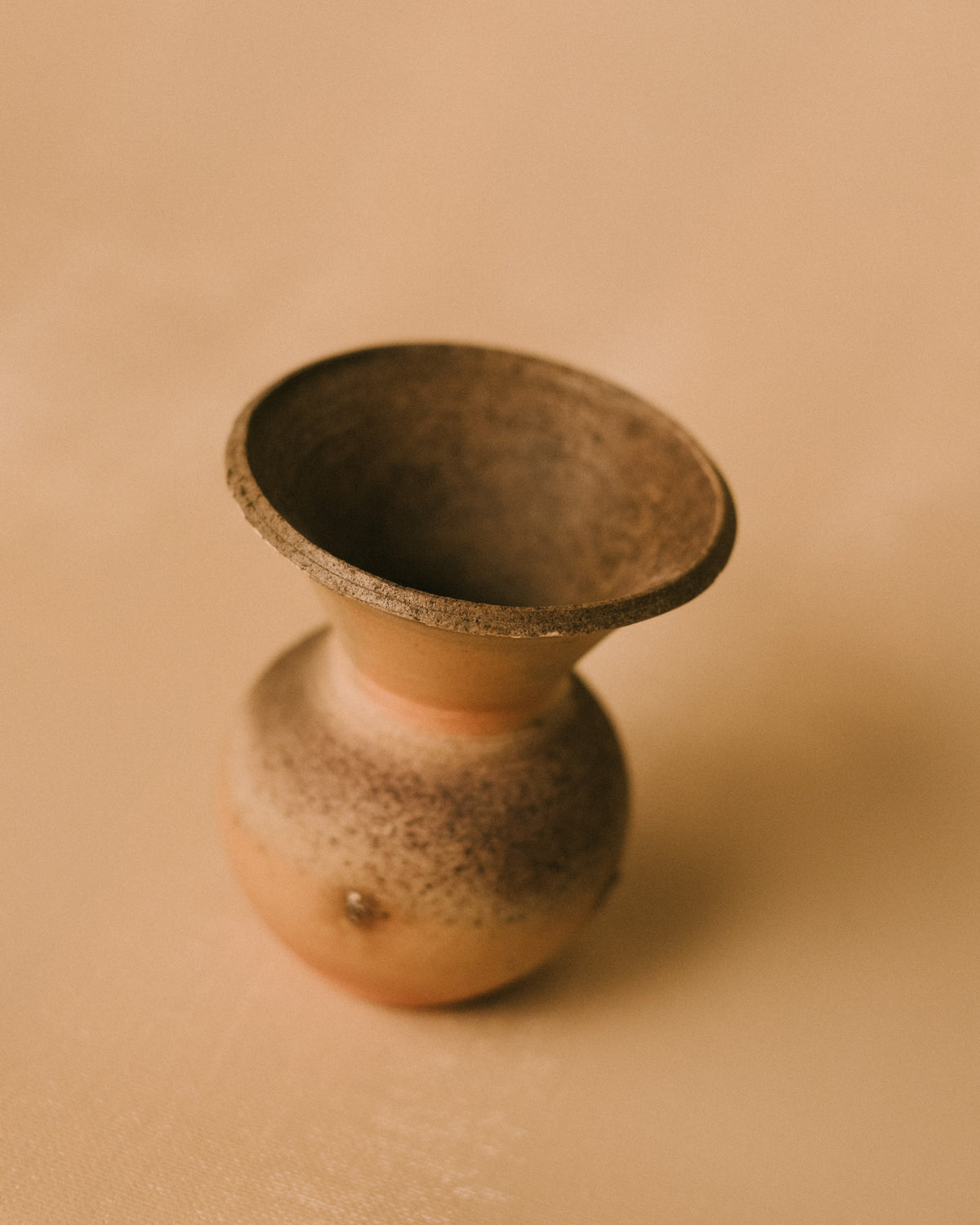 Flared rim of Sharlen Nozawa's Bizenyaki vase, angled view