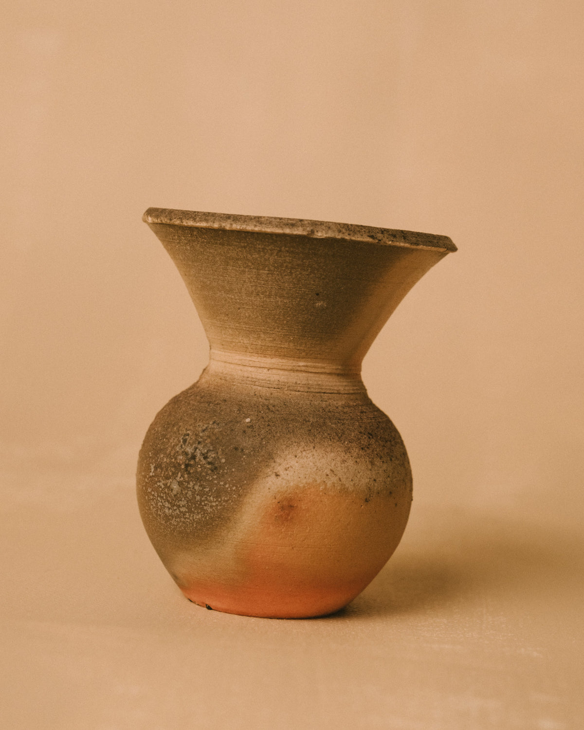 Narrow neck of wood-fired Bizenyaki vase, profile view