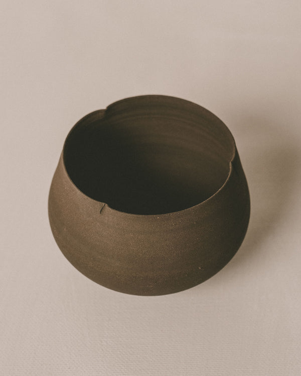 Sharlen Nozawa Lotus Cup in Black, top-down view showing interior of unglazed stoneware form