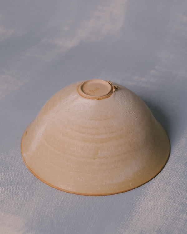 Miso Bowl by Sharlen Nozawa shown inverted, revealing base of hand-shaped white stoneware