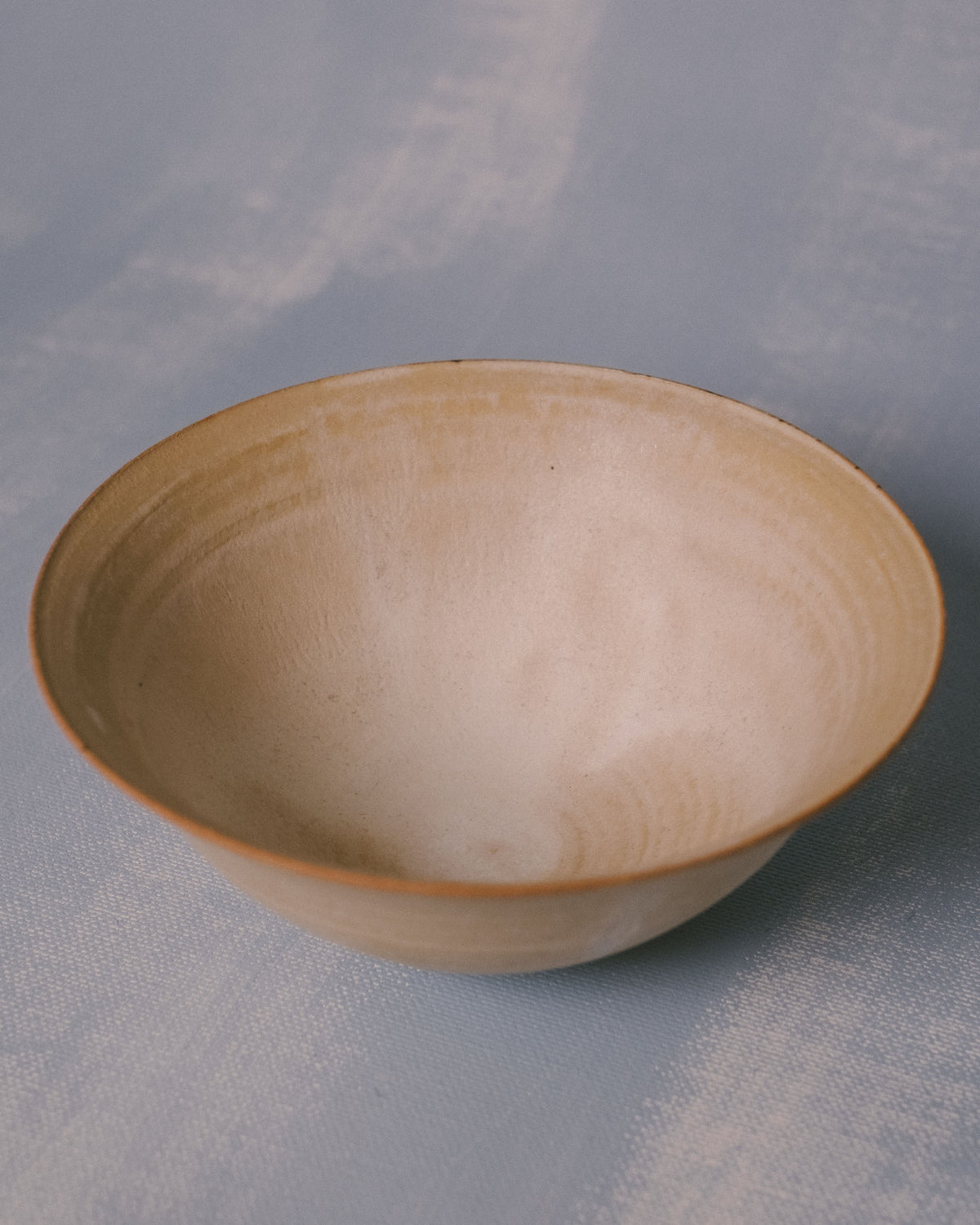 Sharlen Nozawa Miso Bowl, top-down view showing interior of white stoneware with stoney glaze