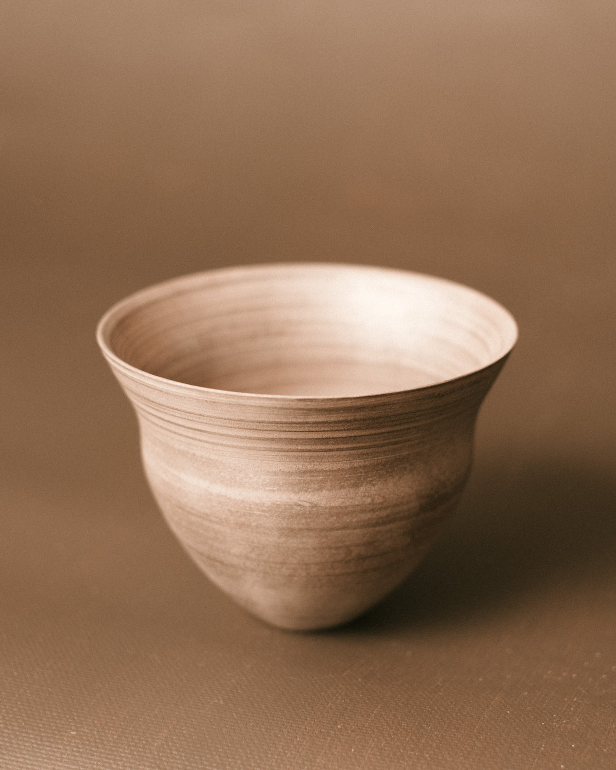 Side profile of Sharlen Nozawa Silver Lustre Cup, hand-thrown ceramic with East Asian influence