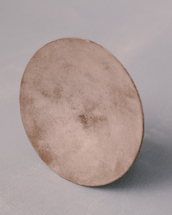 Sharlen Nozawa Silver Lustre Plate, angled view showing silver lustre overglaze and hand-thrown form