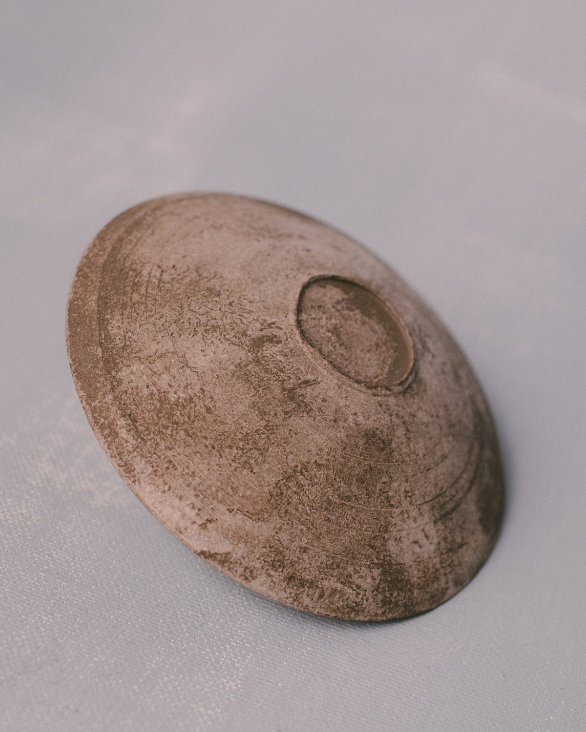 Side profile of Sharlen Nozawa Silver Lustre Plate, hand-thrown ceramic with East Asian influence