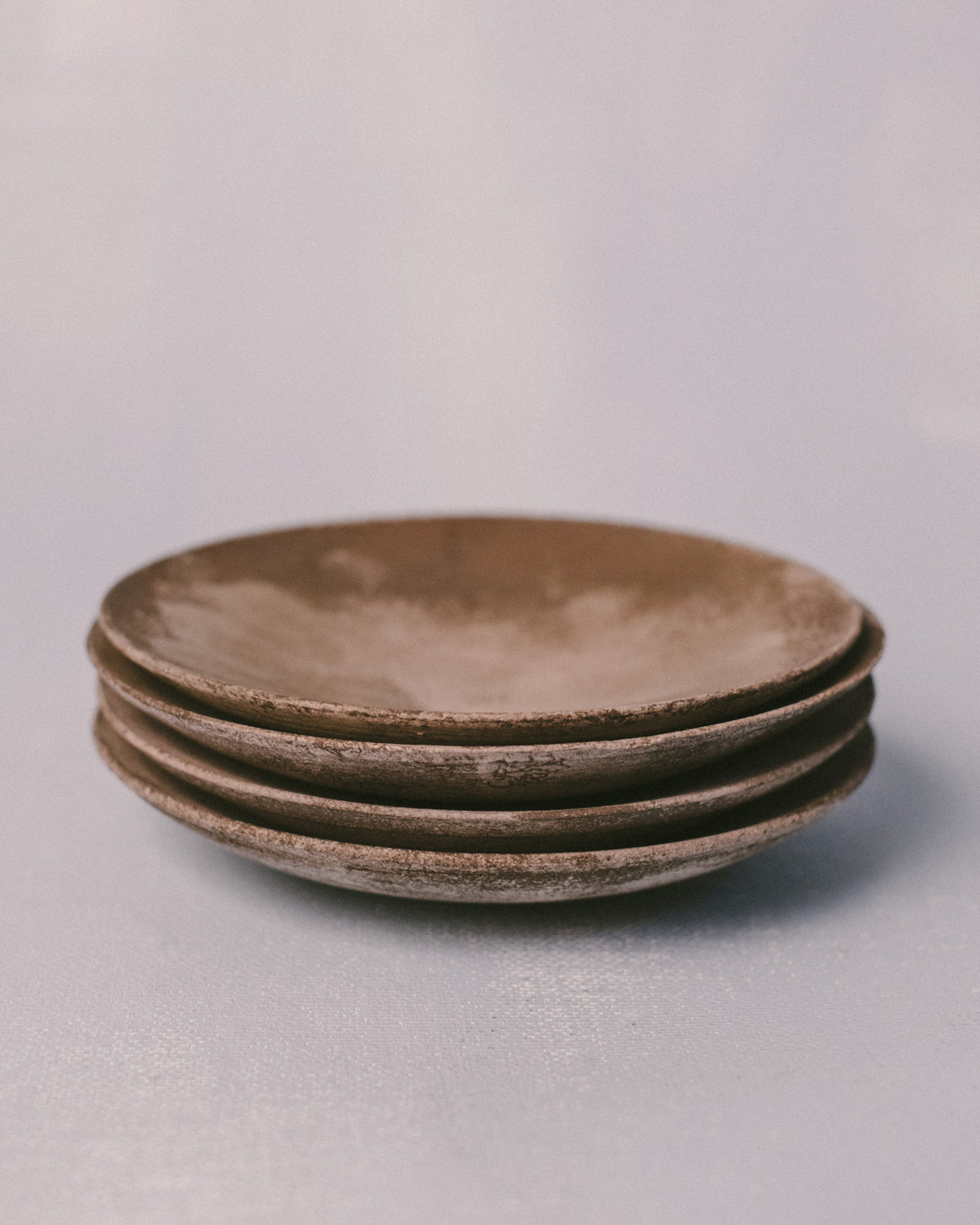 Silver Lustre Plates by Sharlen Nozawa stacked, hand-thrown ceramic from Japan residency