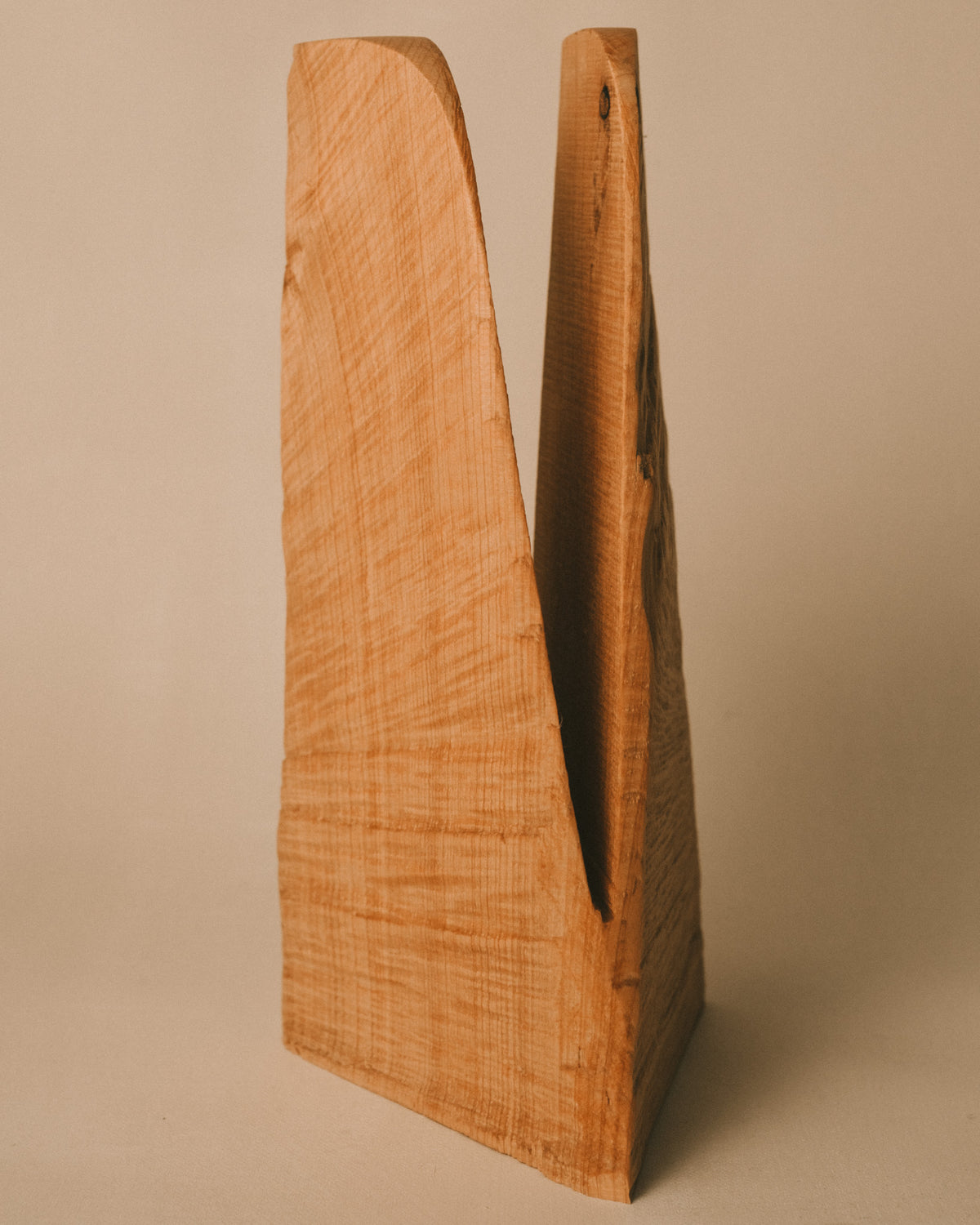 Close-up of carved wood grain on Vince Skelly's Bishop sculpture