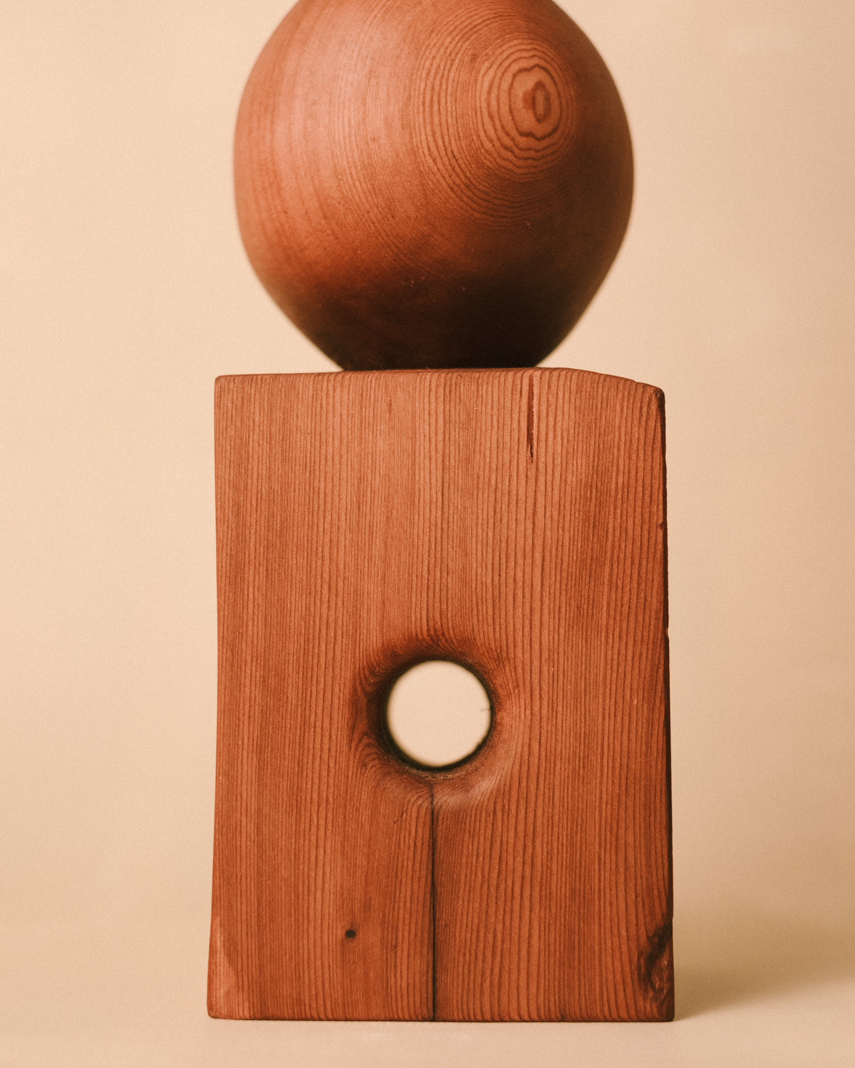Pierced cube base of Sentinel Study 04, carved West Coast timber, close-up