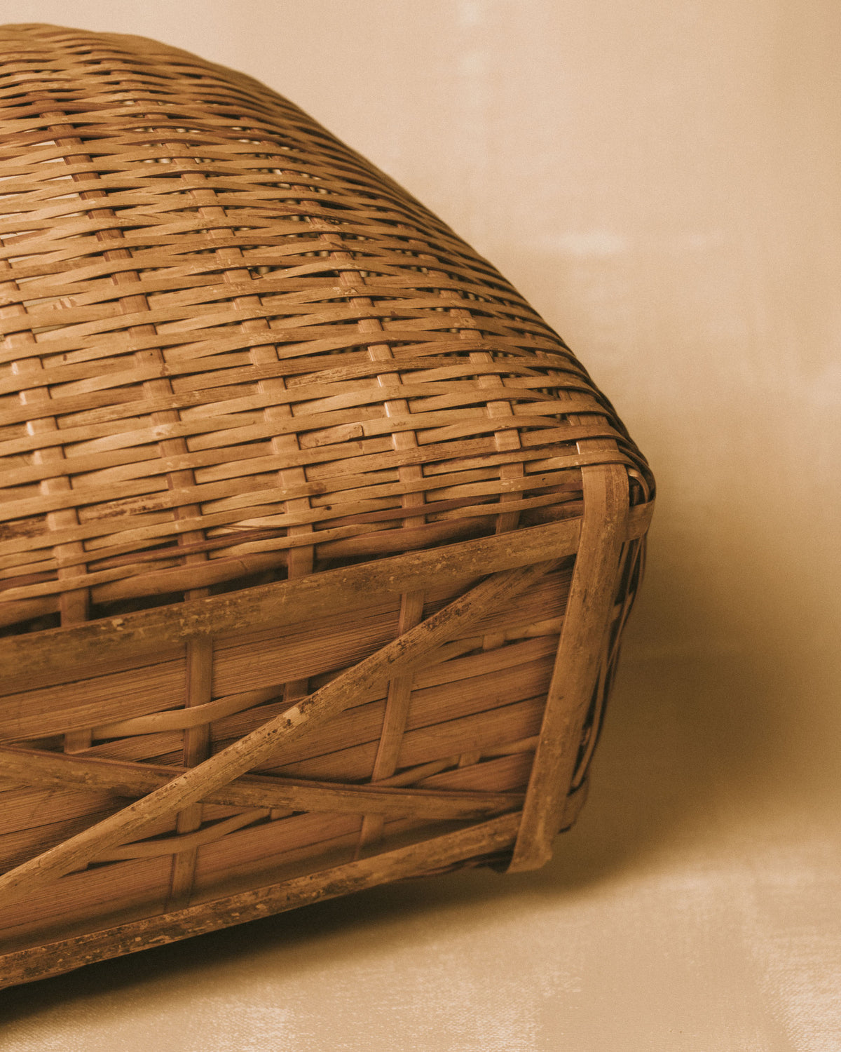 Woven bamboo basket set, tapered form, opposite angle view