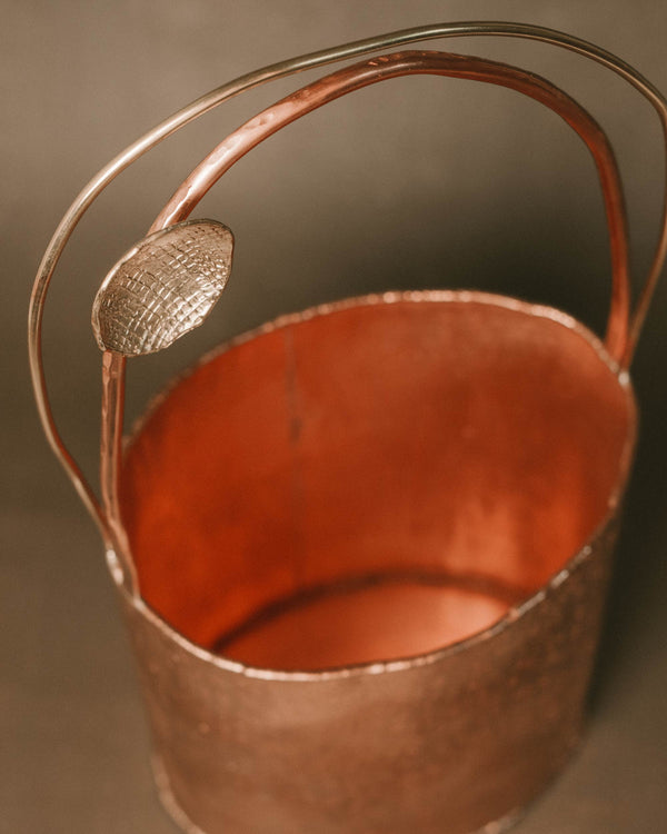 Back view of Yeodong Yun's Basket 3, tactile copper surface