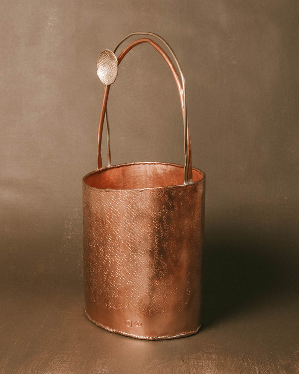 Basket 3 by Yeodong Yun, copper and brass, curved handle, front view