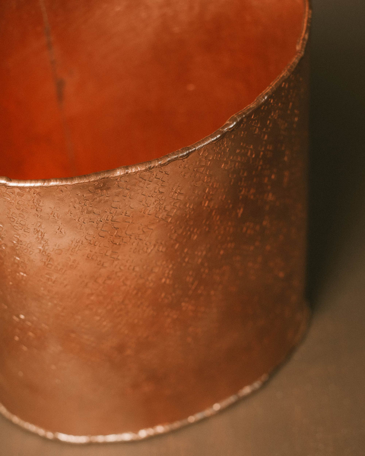 Interior of Basket 3, hand-worked copper with warm patina